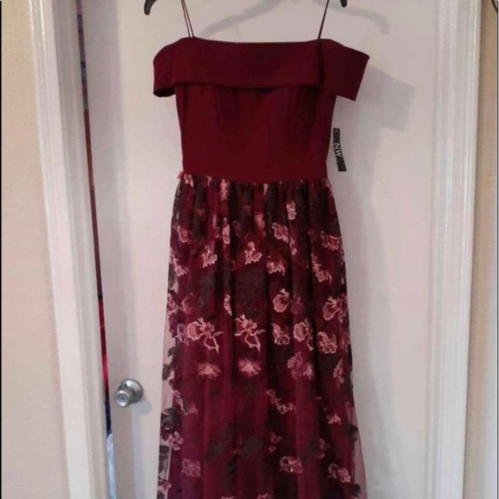 Wine colored dress brand new with tags. Size 6